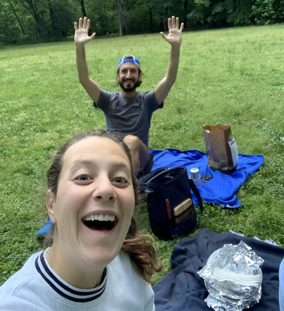 Mike and fellow co-president Sarah during a socially-distant picnic; the Fuqua community