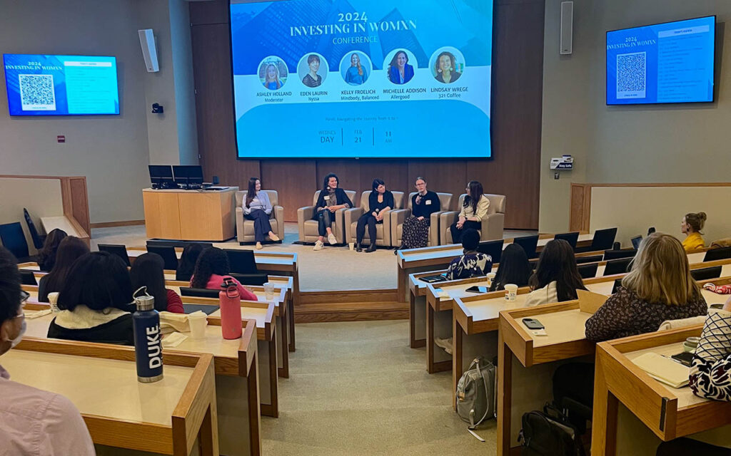 Four women speak on a panel during the Investing in Women Conference at Duke University's Fuqua School of Business