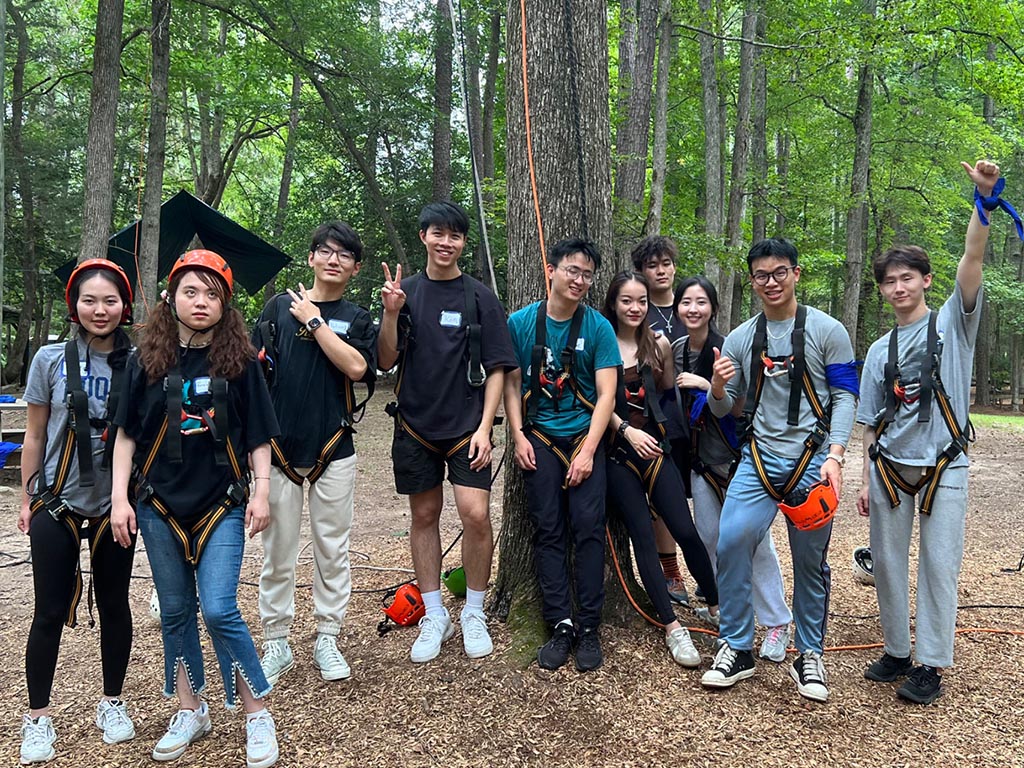 Hantao Gan, an MMS: DKU student, with a larger group of his classmates at Triangle Training Center