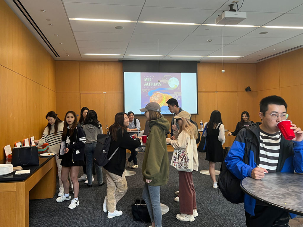 Dozens of students gathered for the mid-autumn festival at Duke University's Fuqua School of Business