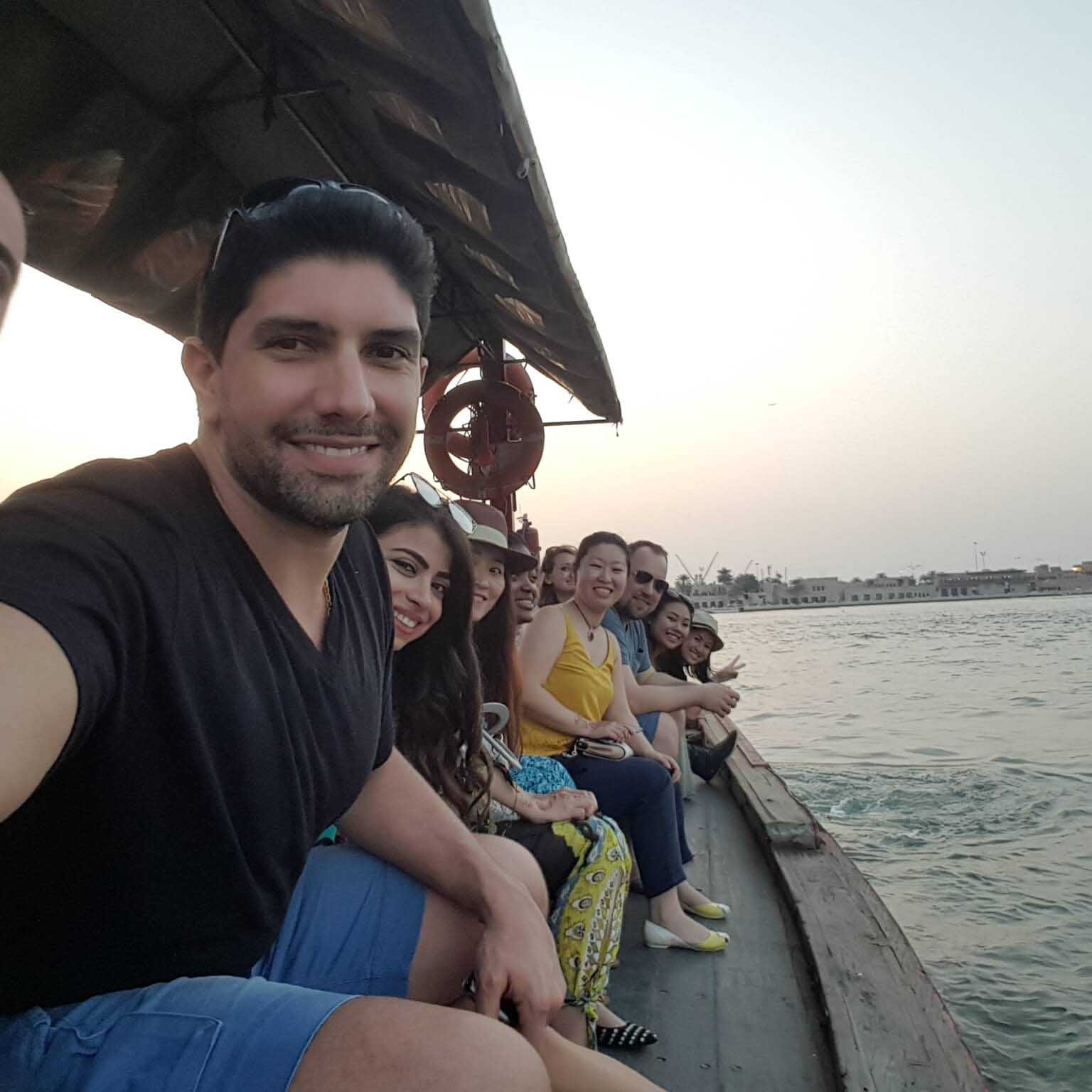 Students on a dhow river boat tour to the Deira Old Souk to visit the spice souk and the gold souk.