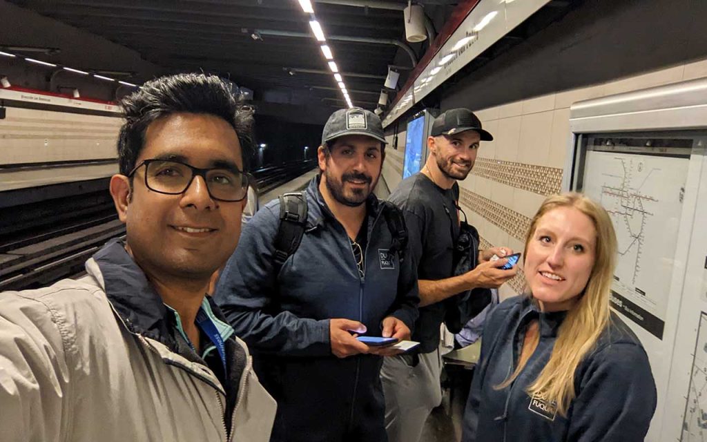 Sushant Gupta and three of his Global Executive MBA classmates at an international train station