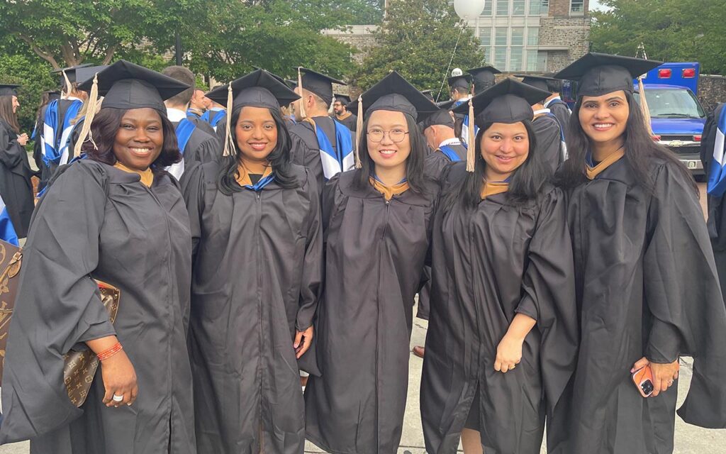 Anu Kalaivanan with her classmates on graduation day from Duke University's Fuqua School of Business