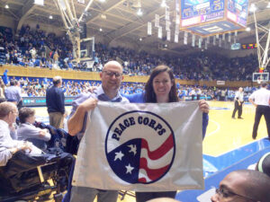 Returned Peace Corps Volunteers at a DUke basketball game - How Fuqua helps the transition from Peace Corps to an MBA