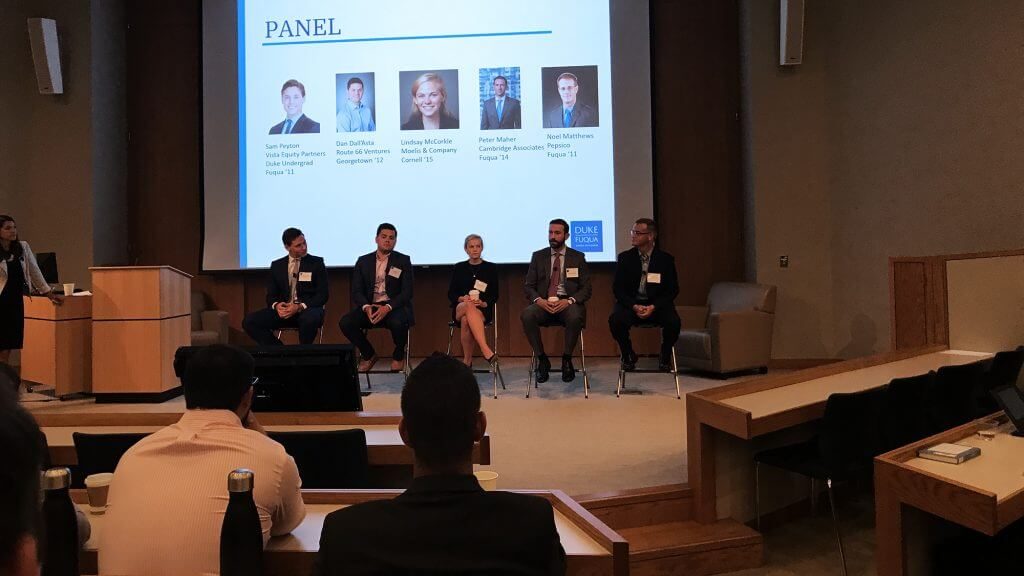 five panel members talk during a session at the finance career intensive