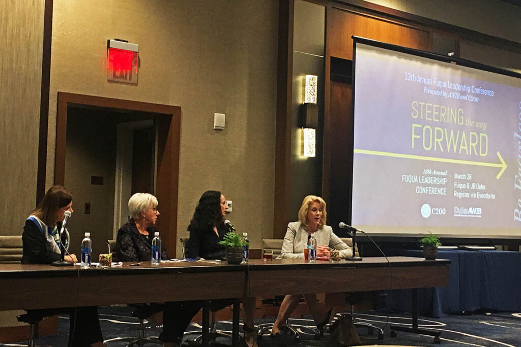 four women on a panel at the women's leadership conference