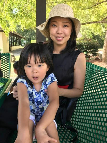 Xinjue and her daughter, moms pursuing MBAs at Fuqua