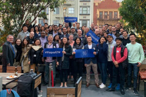 At least 50 members of the Fuqua community gather for a group photo in San Francisco at the Fuqua Around the World 2019 event