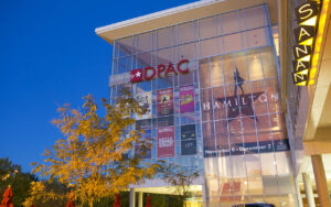 A Hamilton banner hands in front of the Durham Performing Arts Center