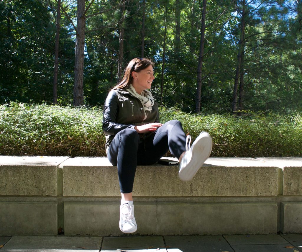 Jessie Ambrose posting outdoors on Fuqua's campus, part of the Fuquans series