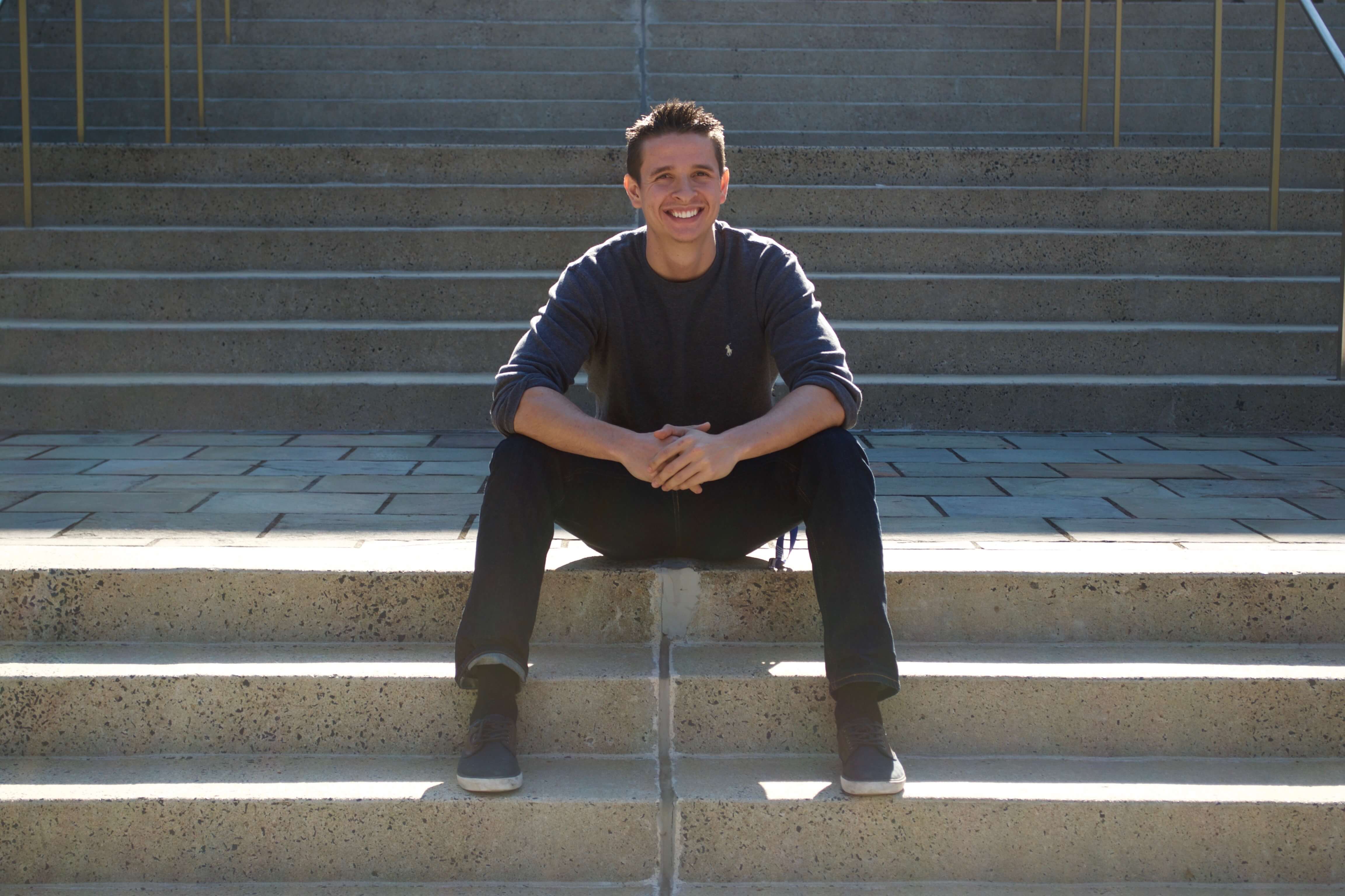 Michael Mann sitting on the front steps of Fuqua, part of the Fuquans series