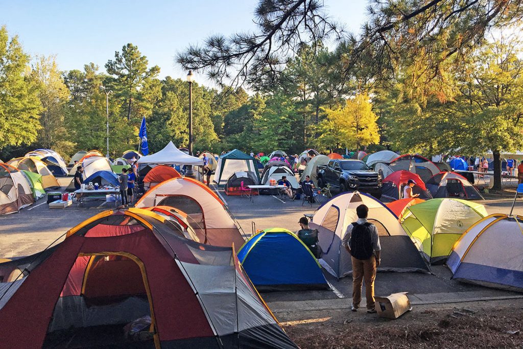 dozens of tents scattered in the Campout parking lot, scenes of basketball at Duke