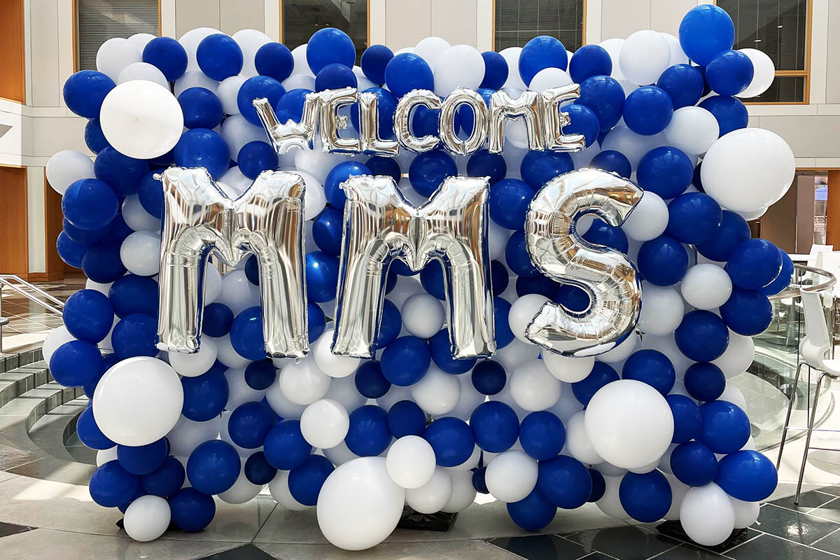 balloons forming a sign that says "Welcome MMS"