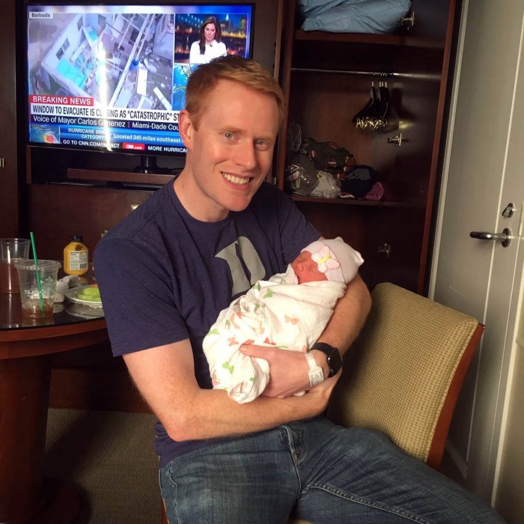 a student holding his newborn baby, things I learned in my MBA program