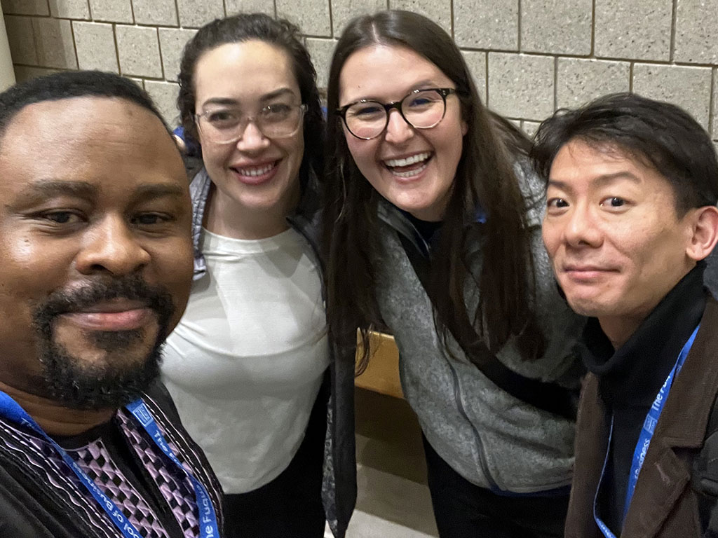 Philip Kaikai and three other Global Executive MBA students pose for photo at Duke University's Fuqua School of Business