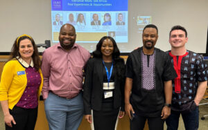 Philip Kaikai and three students pose for photo after "EMBAs Talk Africa" event at Duke University's Fuqua School of Business