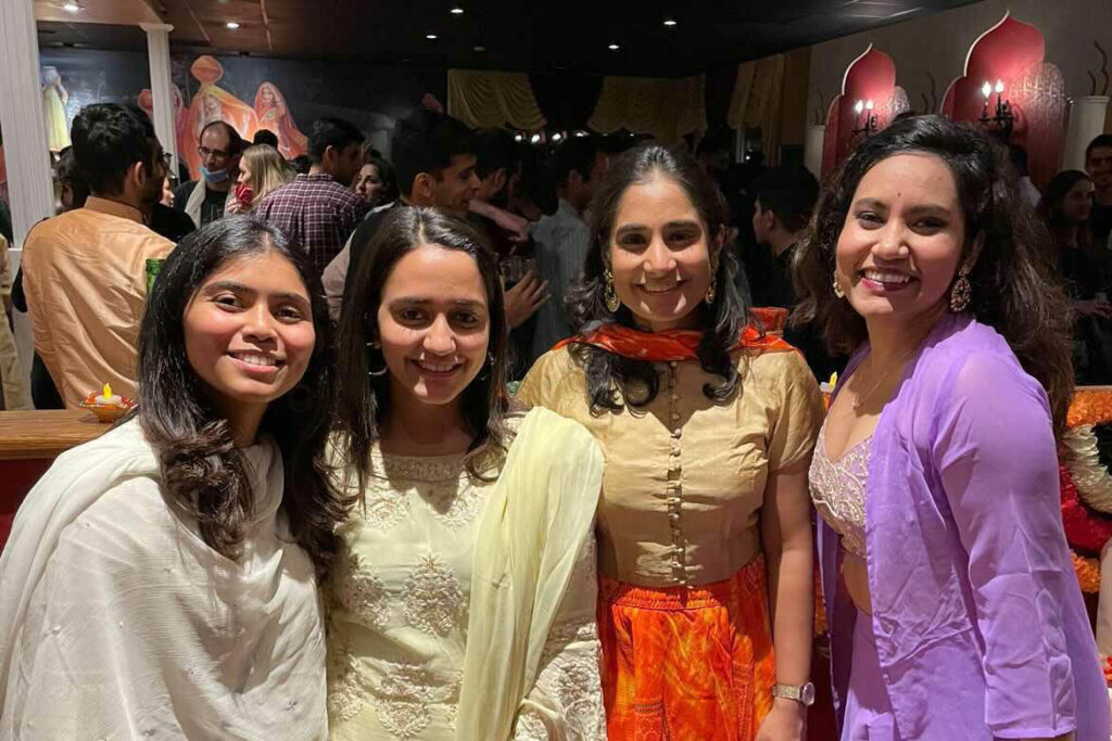 Vani and 3 classmates in traditional India dresses