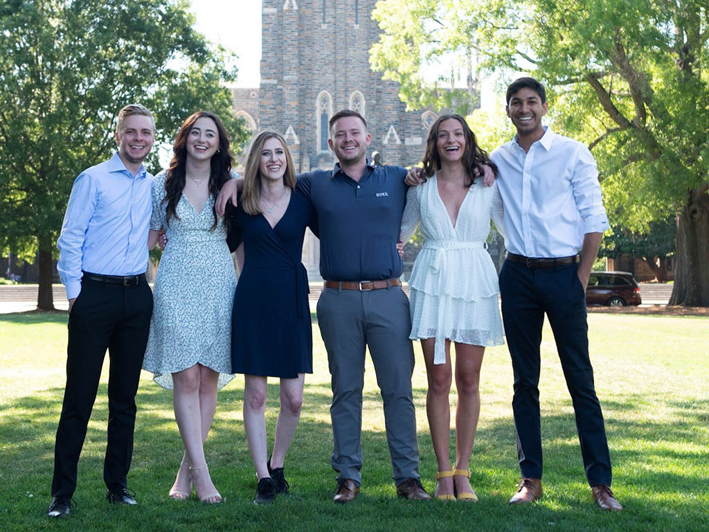 Chelsea Alford with her Fuqua classmates in front of Duke Chapel