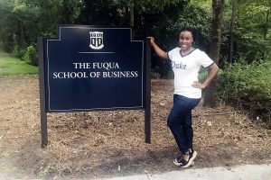 Nady posing beside the Fuqua sign; when is the right time to apply for an MBA